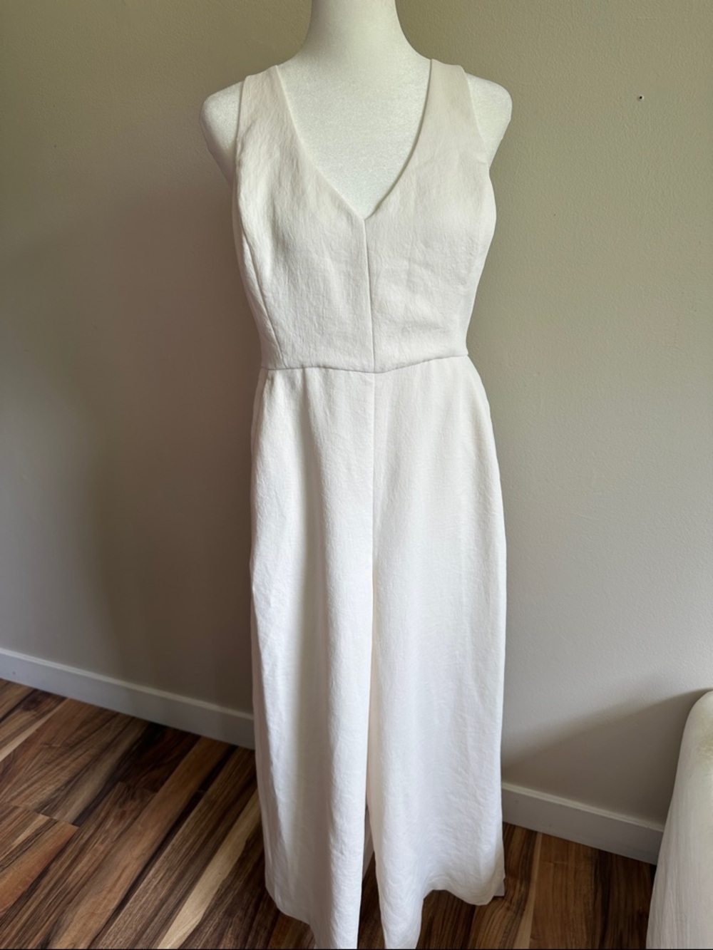 Wilfred Chic Sleeveless Cream V-Neck Jumpsuit with Pocket